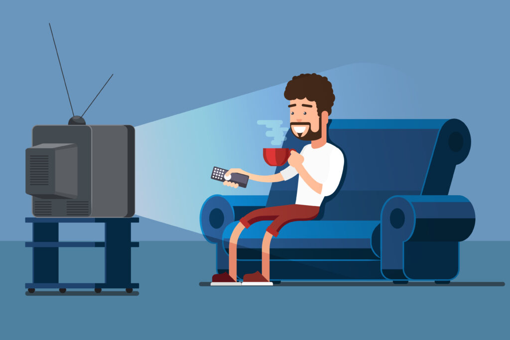 Man watching TV and using IPTV